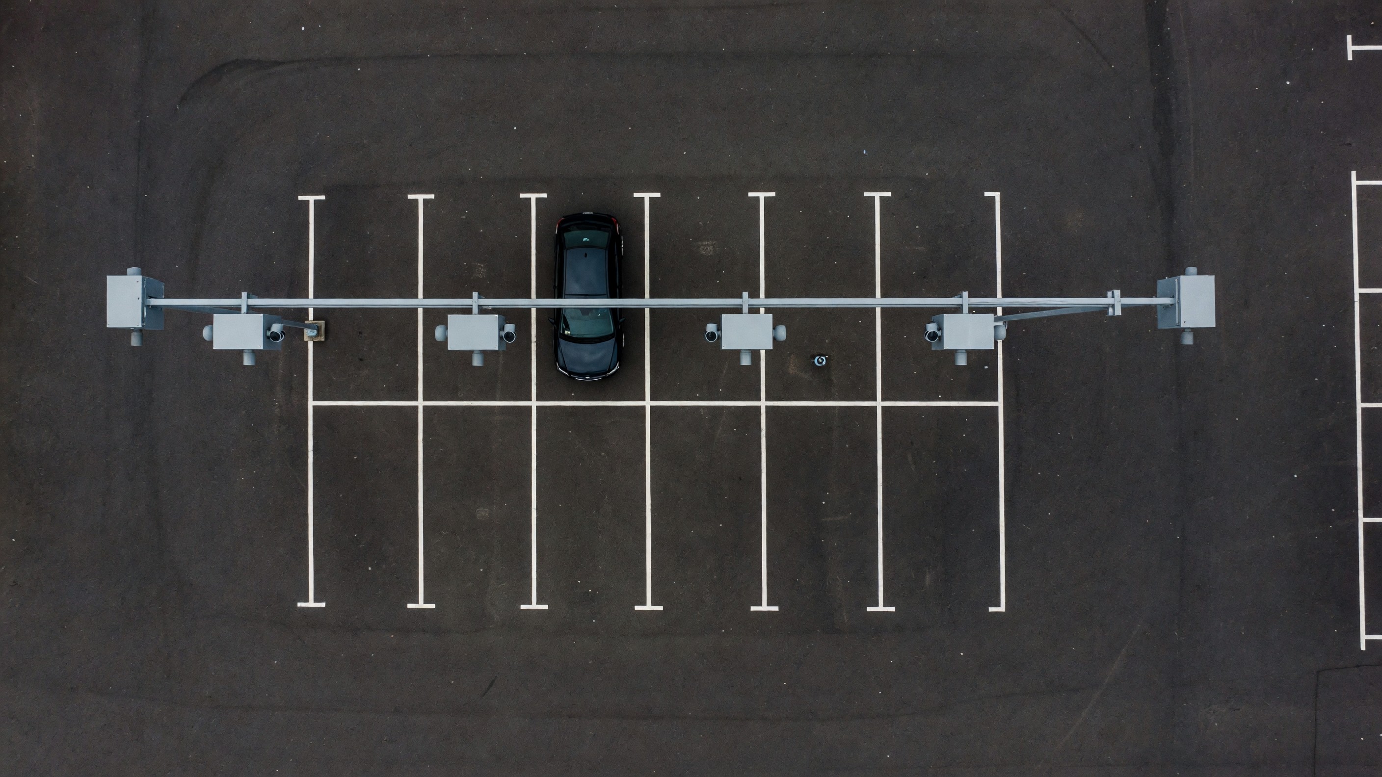 Choosing a Parking Sensor Technology in 2026: What In-Ground Magnetic, Ultrasonic, Camera, and Radar Actually Cost Per Space